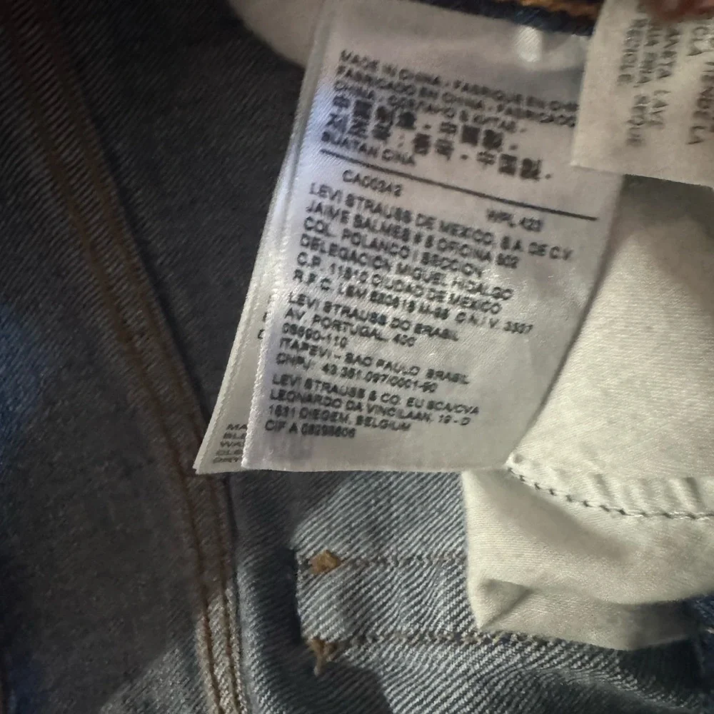Upcycled Grommet design button fly Levi’s size 28